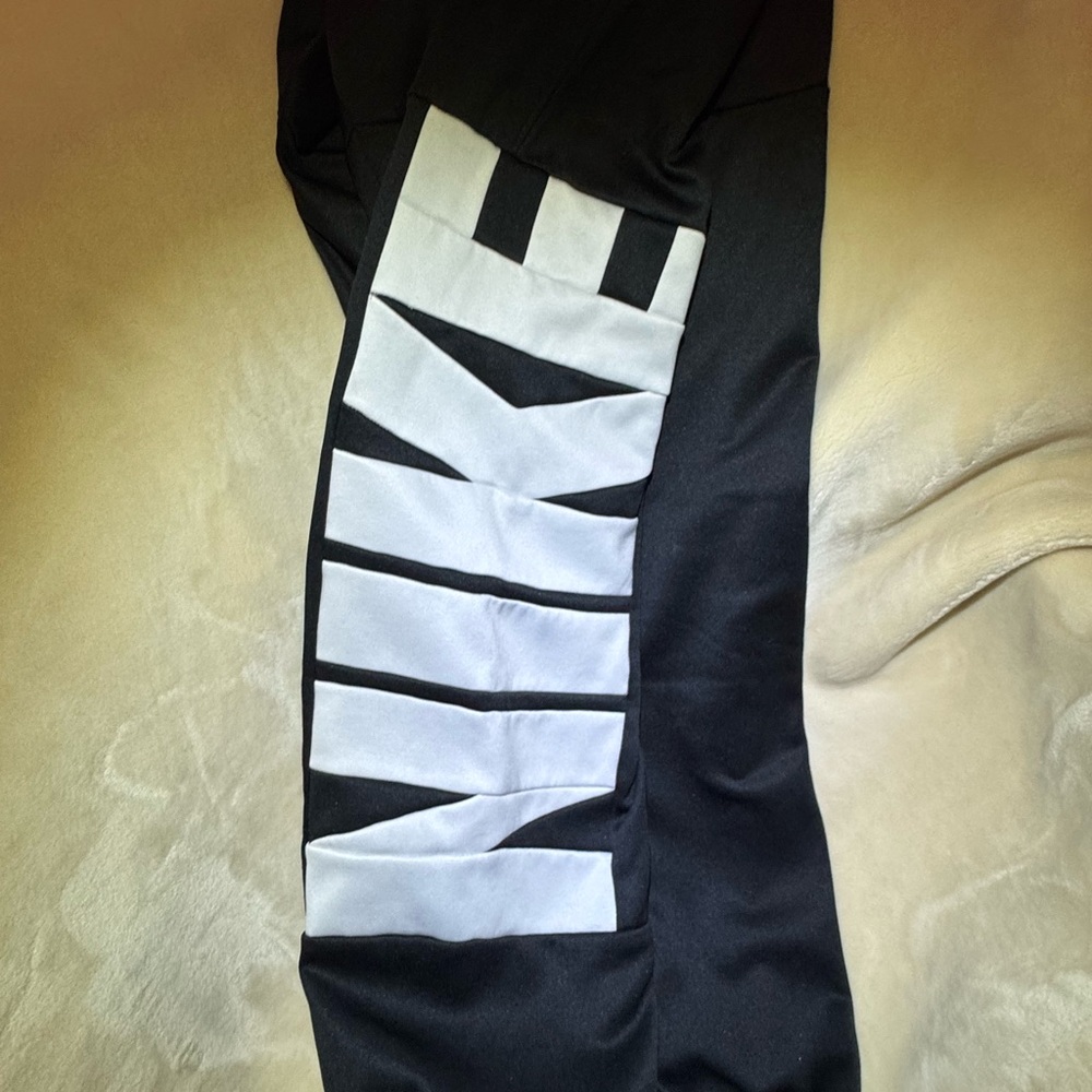 Nike Therma-Fit Joggers, men’s medium, black w/ large white “NIKE” logo.